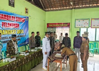 Kapolsek Kaliori Hadiri Pelantikan dan Pengambilan Sumpah Janji Perangkat Desa Pengkol